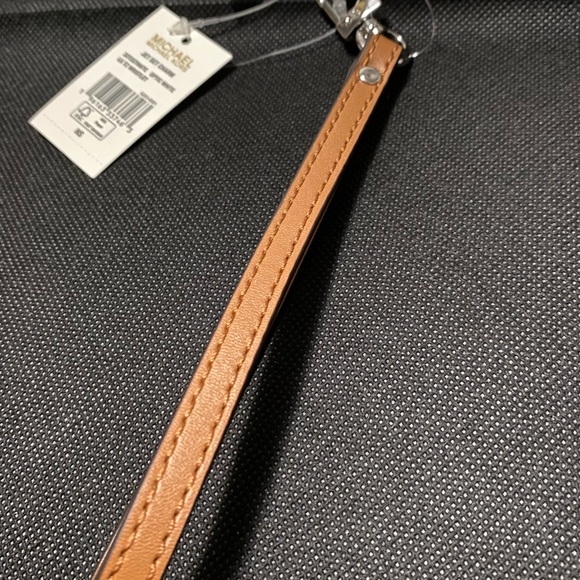 Michael Kors Large Rainbow Embellished Logo Canvas Pouch. - Picture 10 of 11